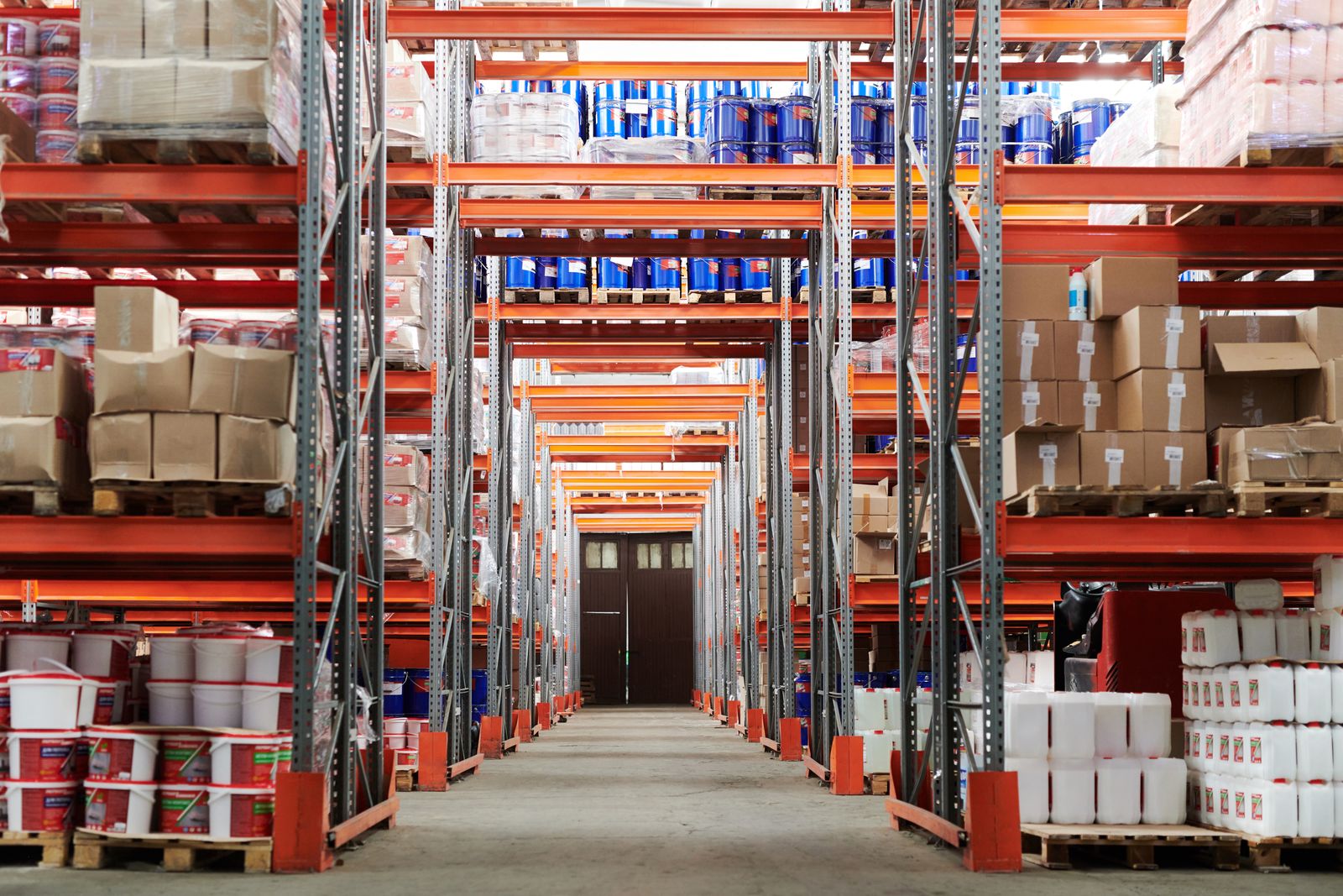 Warehouse racks stocked with bulk and bagged goods